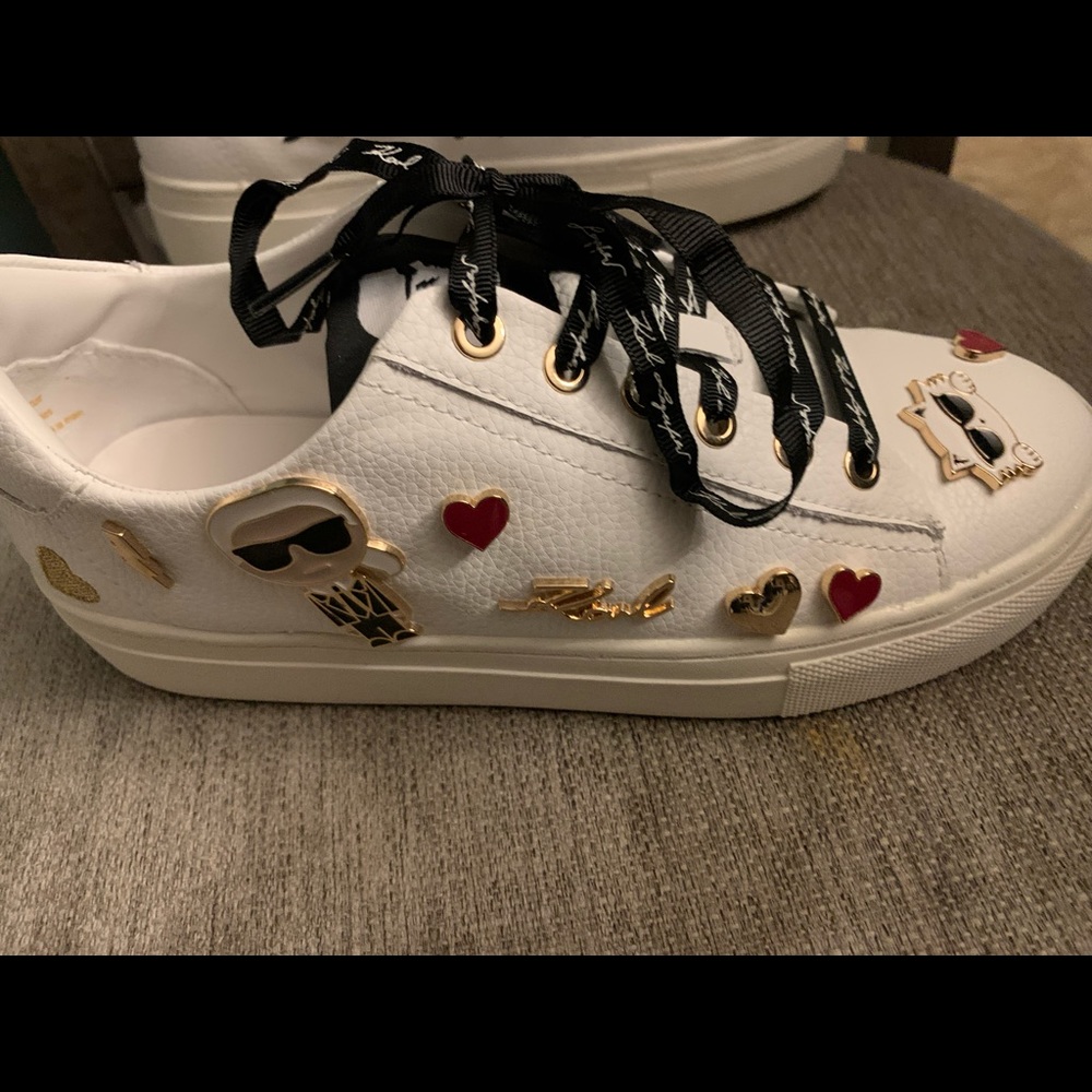 Brand new sneakers very cute just to small and can’t return.